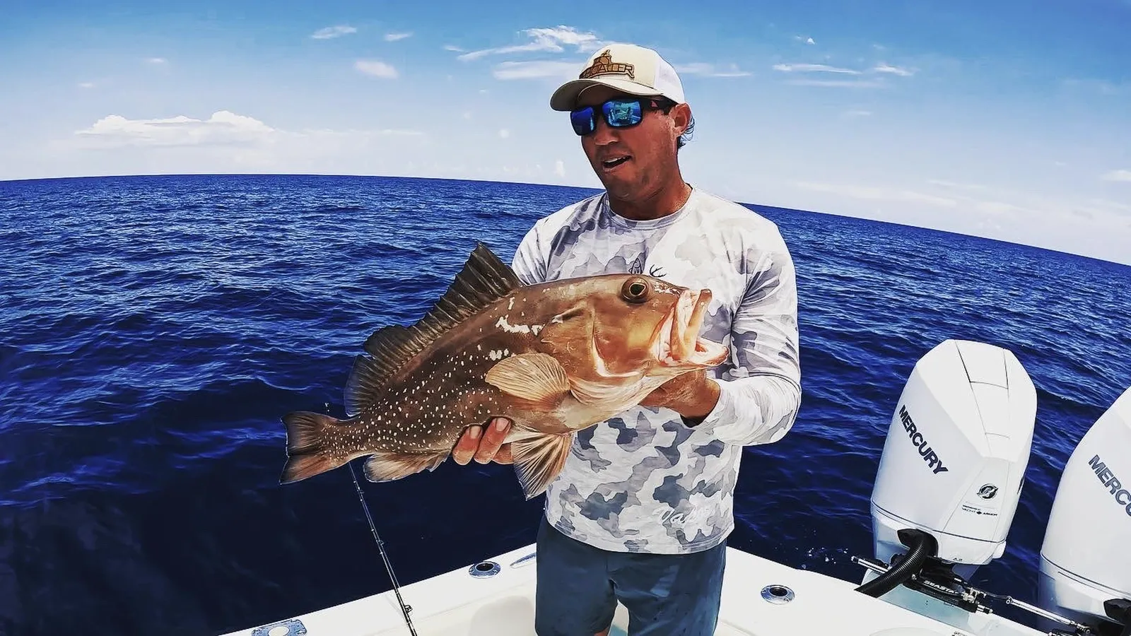 fishing-charters-catch-of-the-day-in-the-open-sea-with-fisherman
